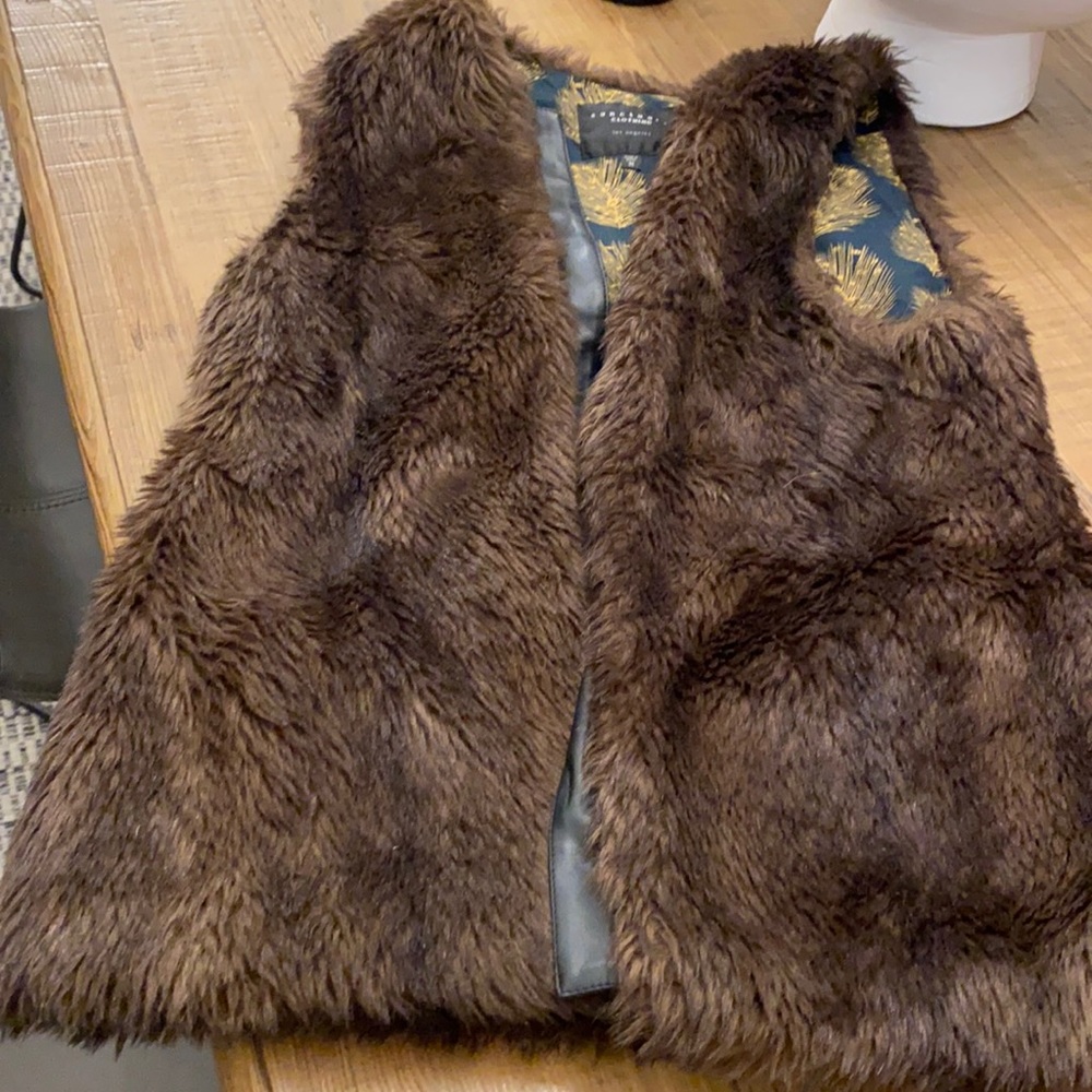 Faux fur with faux leather trim vest